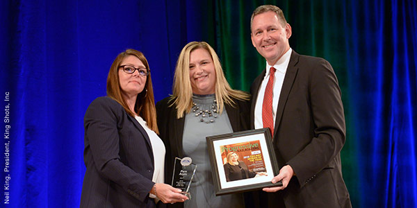 Pam Arpin accepting award